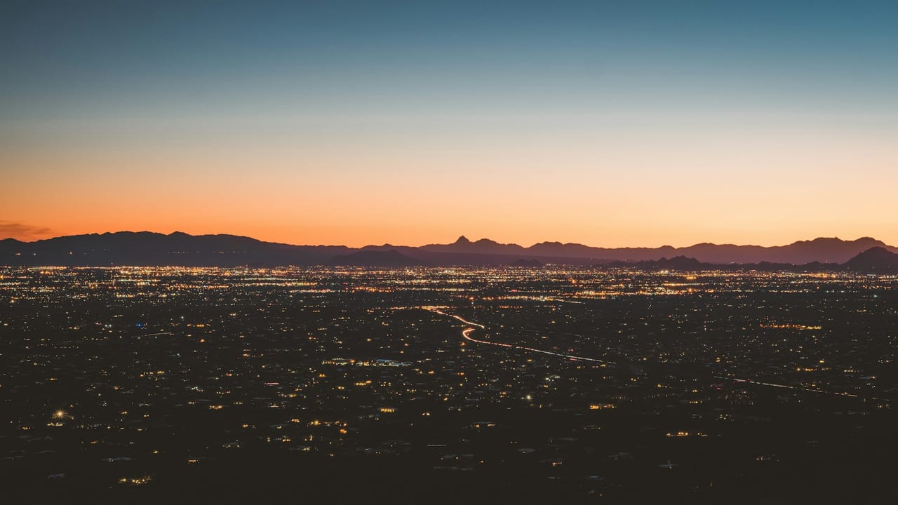 Tucson skyline and surrounding mountains at sunset, Arizona